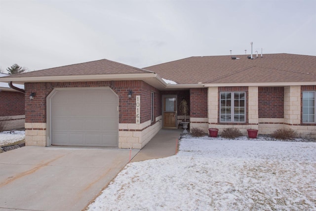 ranch-style home featuring a garage