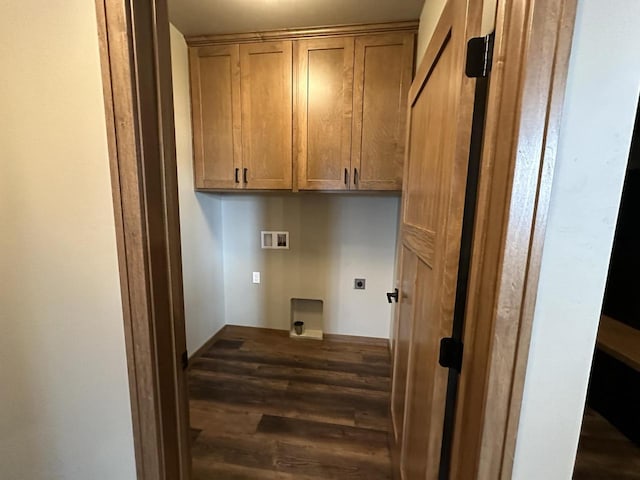 clothes washing area featuring washer hookup, dark hardwood / wood-style flooring, cabinets, and hookup for an electric dryer