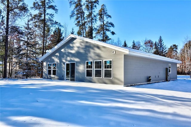 view of snow covered property