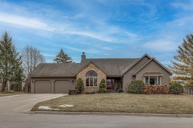 ranch-style home with a front yard and a garage