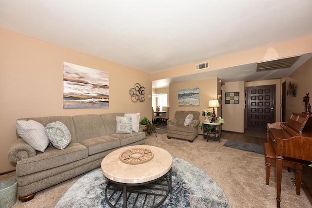 living room with light colored carpet