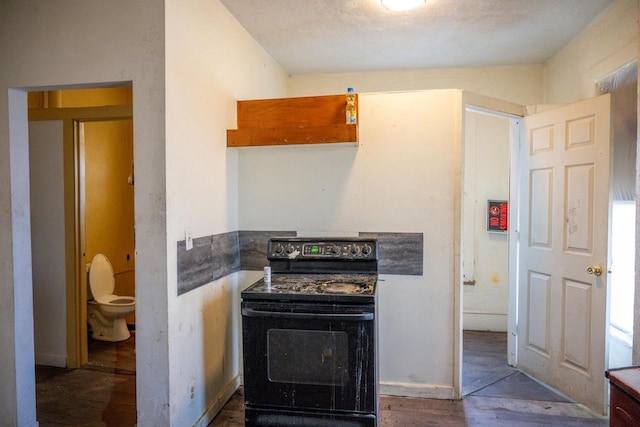 kitchen featuring black electric range