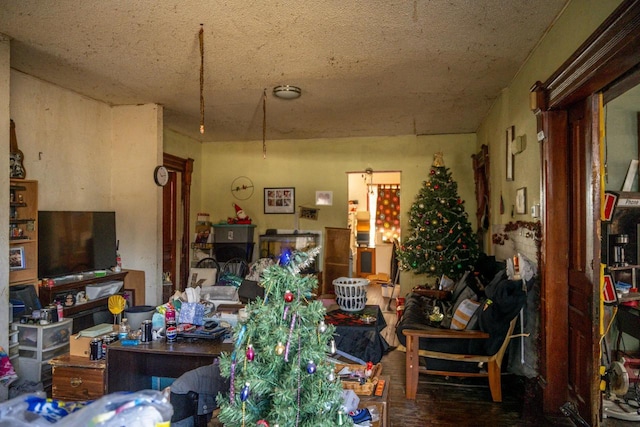 miscellaneous room with a textured ceiling