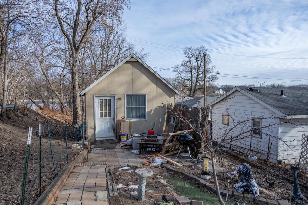 back of property featuring a patio area