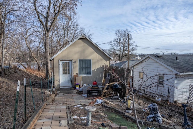 249 W State St, Mauston, WI 53948 - back of property featuring a patio area