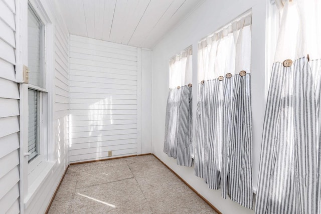 616 Elk St, Sabula, IA 52070 - unfurnished room with wood walls and wooden ceiling