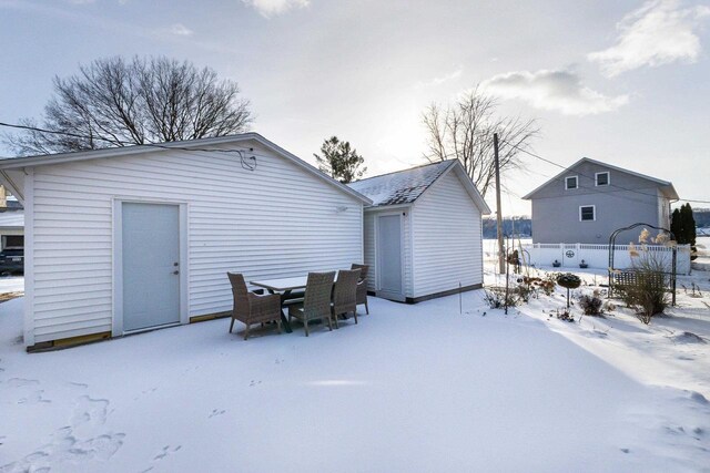 616 Elk St, Sabula, IA 52070 - view of snow covered rear of property