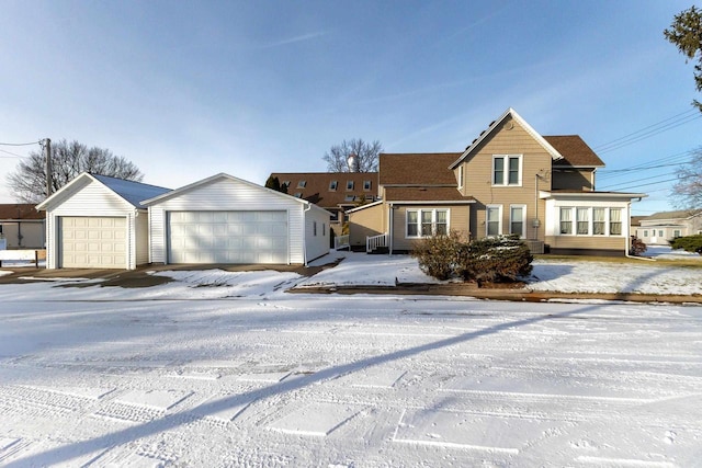 616 Elk St, Sabula, IA 52070 - view of property featuring a garage