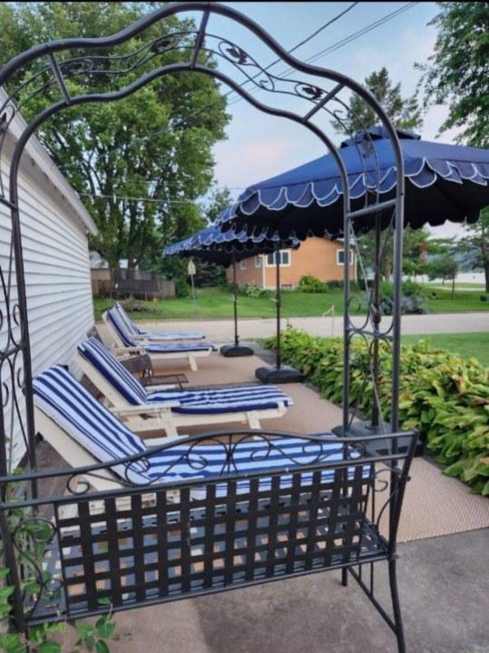 616 Elk St, Sabula, IA 52070 - surrounding community with a patio area and an outdoor hangout area