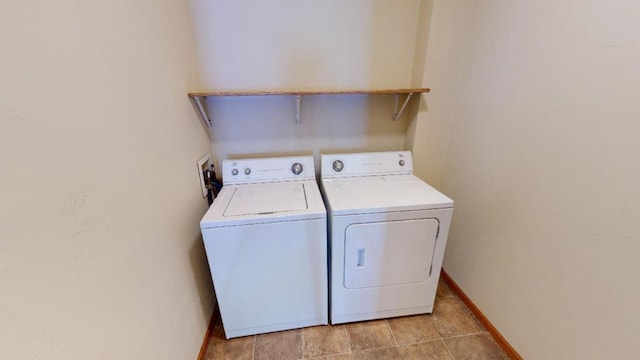 laundry room with separate washer and dryer