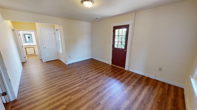 foyer entrance featuring dark hardwood / wood-style flooring