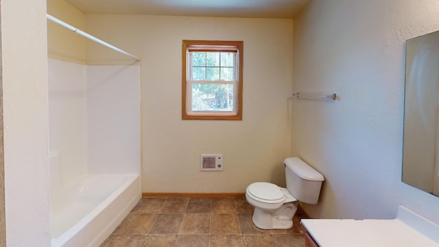 full bathroom featuring vanity, shower / bath combination, and toilet