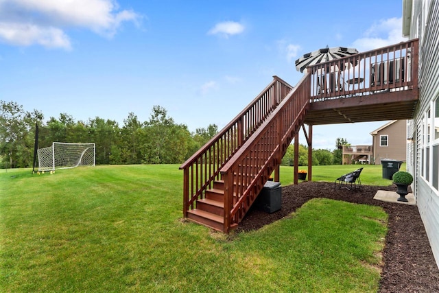 view of yard featuring a wooden deck