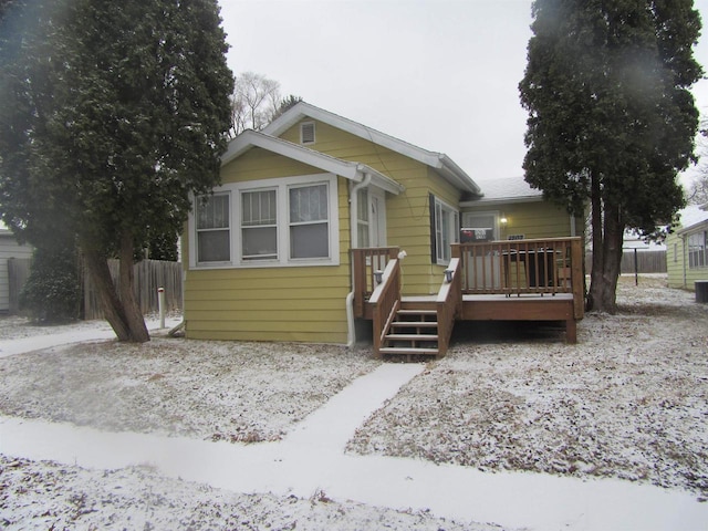 view of front of home with a deck