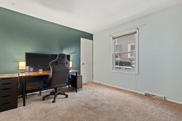 office space with light colored carpet