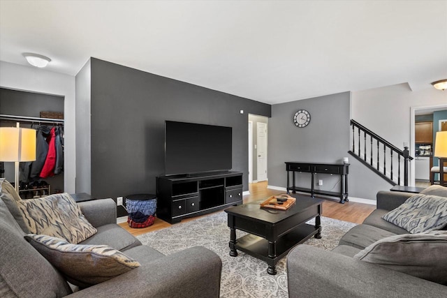 living room with light hardwood / wood-style flooring