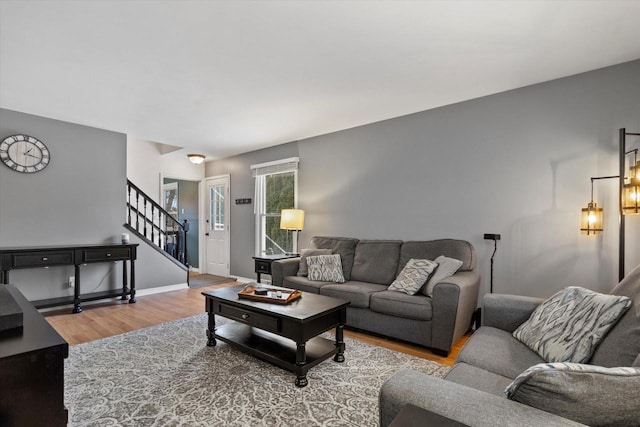 living room with light hardwood / wood-style flooring