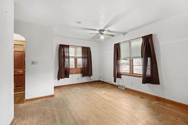 spare room featuring ceiling fan and wood-type flooring