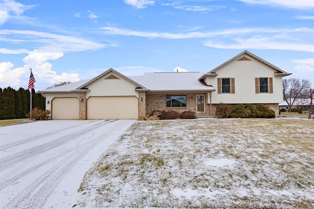 view of front of home with a garage