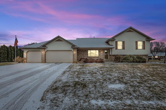 split level home with a garage