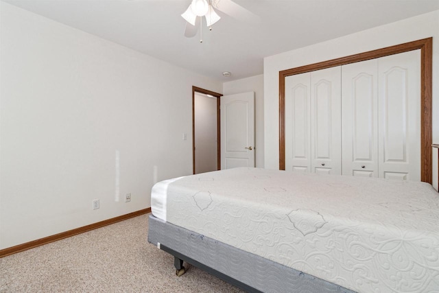 bedroom with carpet flooring, ceiling fan, and a closet