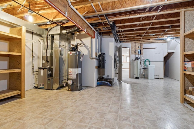 basement featuring heating unit and water heater