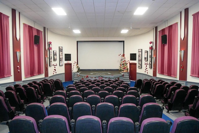 cinema room with a drop ceiling