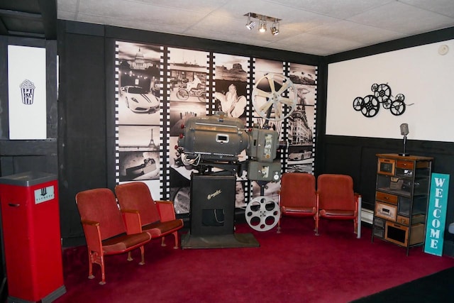 playroom featuring carpet and a paneled ceiling