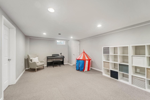 sitting room with carpet flooring