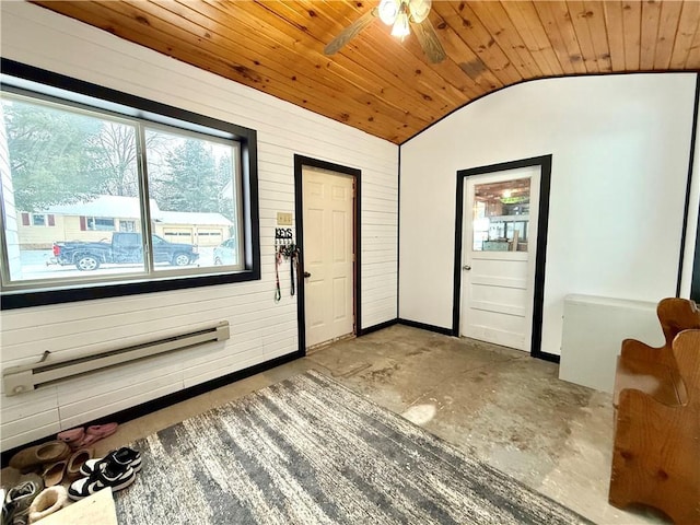 doorway to outside featuring ceiling fan, baseboard heating, lofted ceiling, and wood ceiling