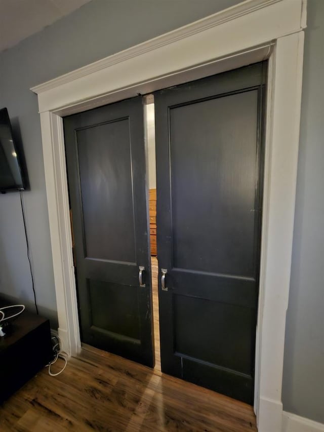 doorway to outside with dark hardwood / wood-style floors