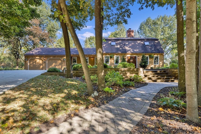 view of front of house with a garage