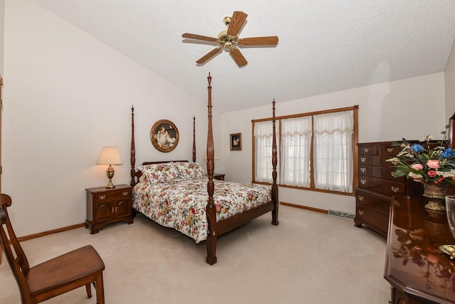 bedroom with light carpet, a textured ceiling, and ceiling fan