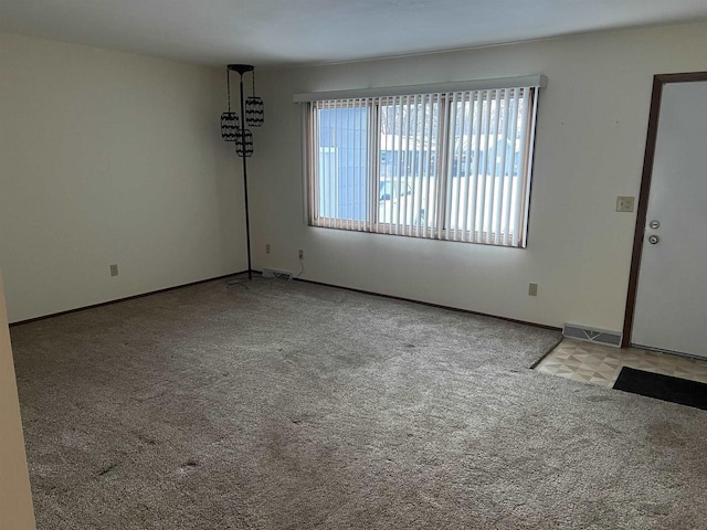 view of carpeted spare room