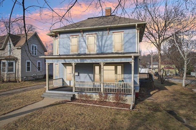 view of front of house with covered porch