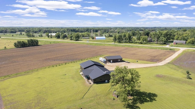 birds eye view of property with a rural view