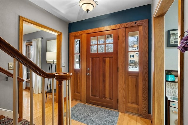 entrance foyer with light wood-type flooring