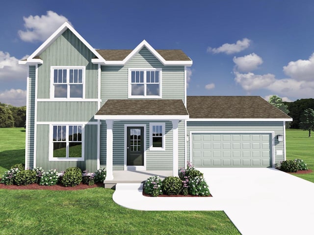 view of front of home featuring a garage and a front lawn