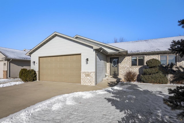 ranch-style home with a garage