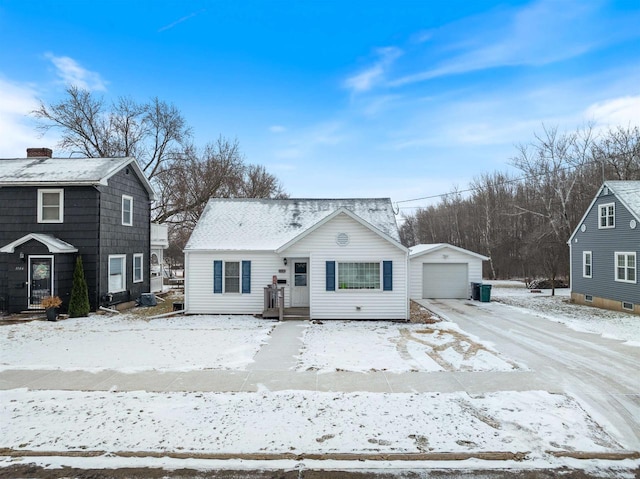 front of property featuring an outbuilding and a garage