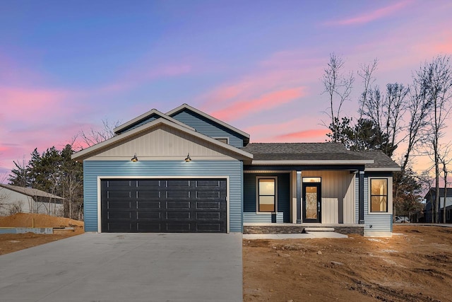 view of front of property with a garage