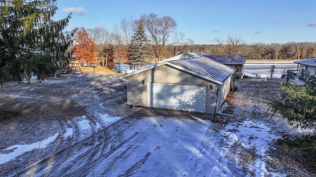 exterior space with a garage