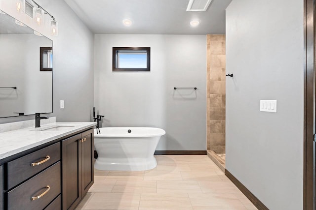 bathroom with tile patterned floors, independent shower and bath, and vanity