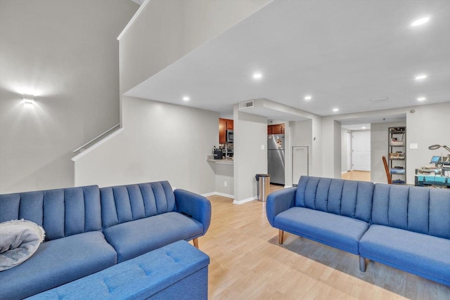 living room featuring light wood-type flooring