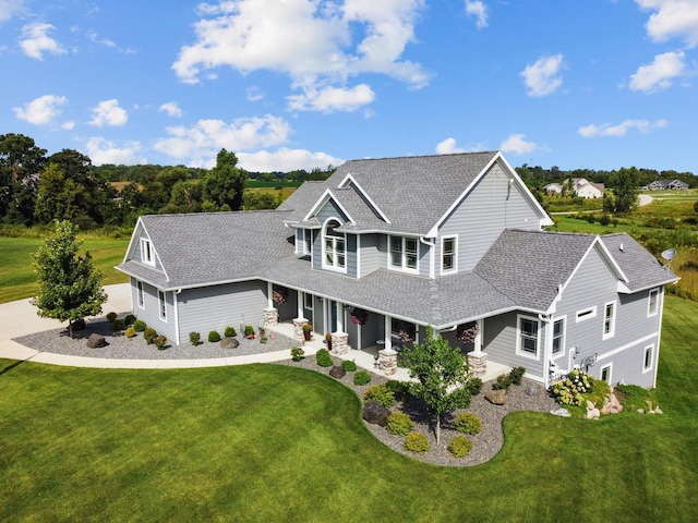 view of front of home featuring a front yard