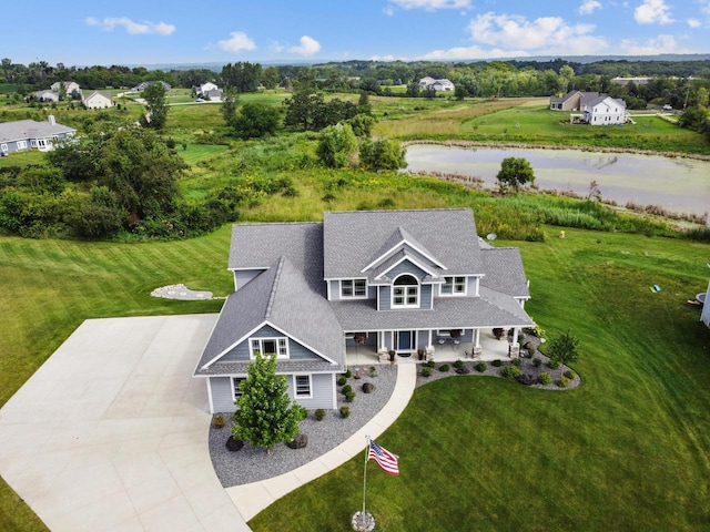 bird's eye view with a water view