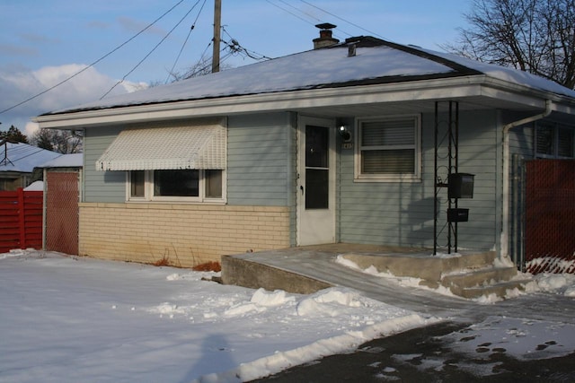 bungalow-style house featuring covered porch