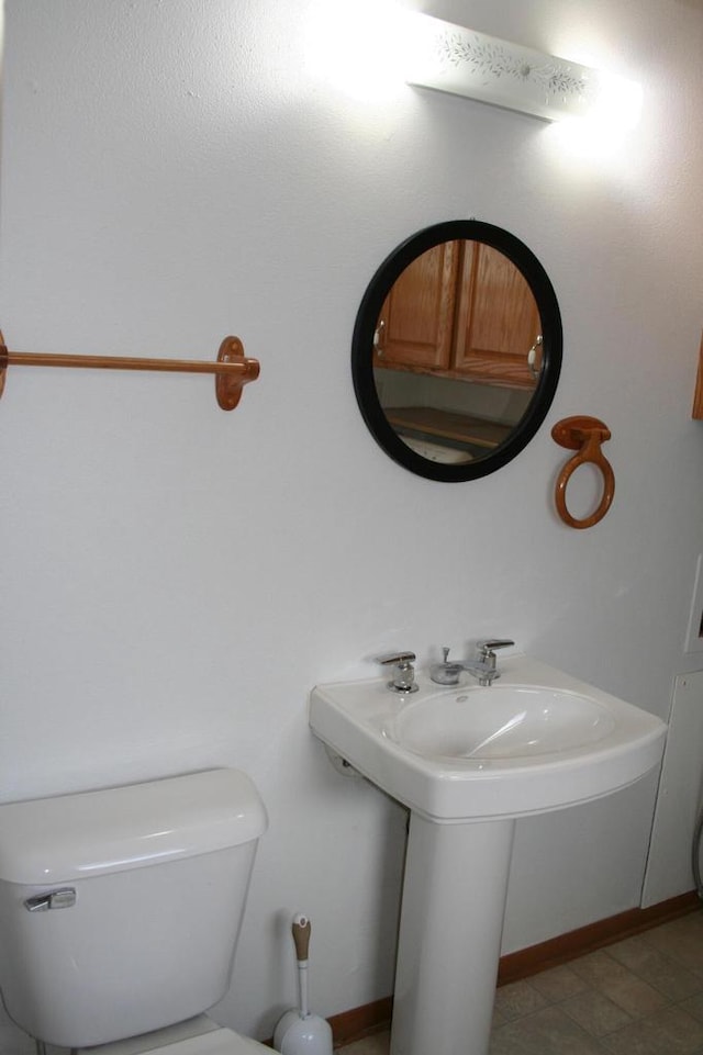 bathroom featuring toilet