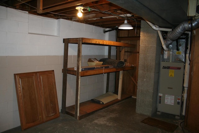 basement featuring heating unit