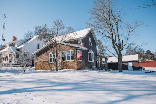 view of snow covered house